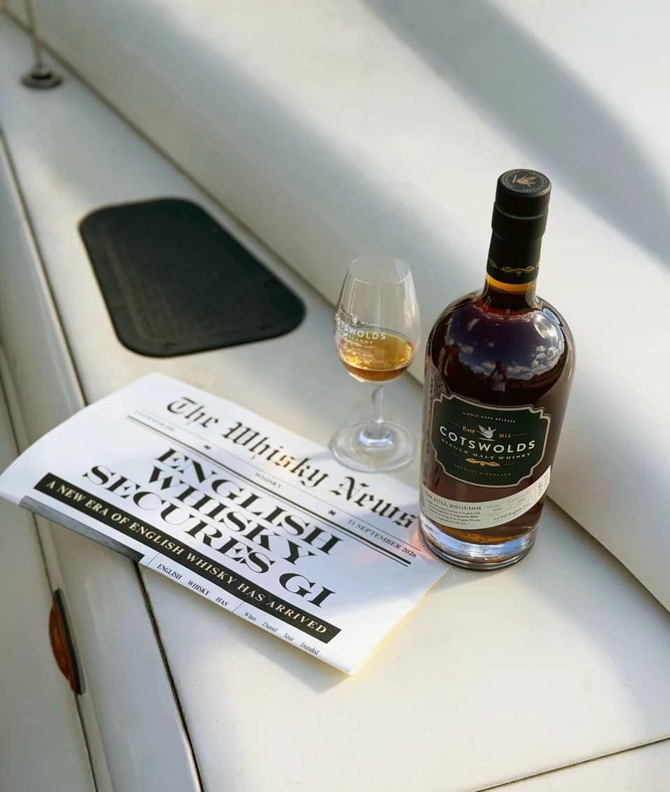 The Full English Single Cask Single Malt Whisky with a Whisky News newspaper
