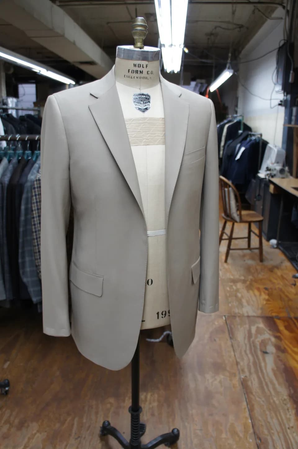 Obama tan suit on a bust at Martin Greenfield factory