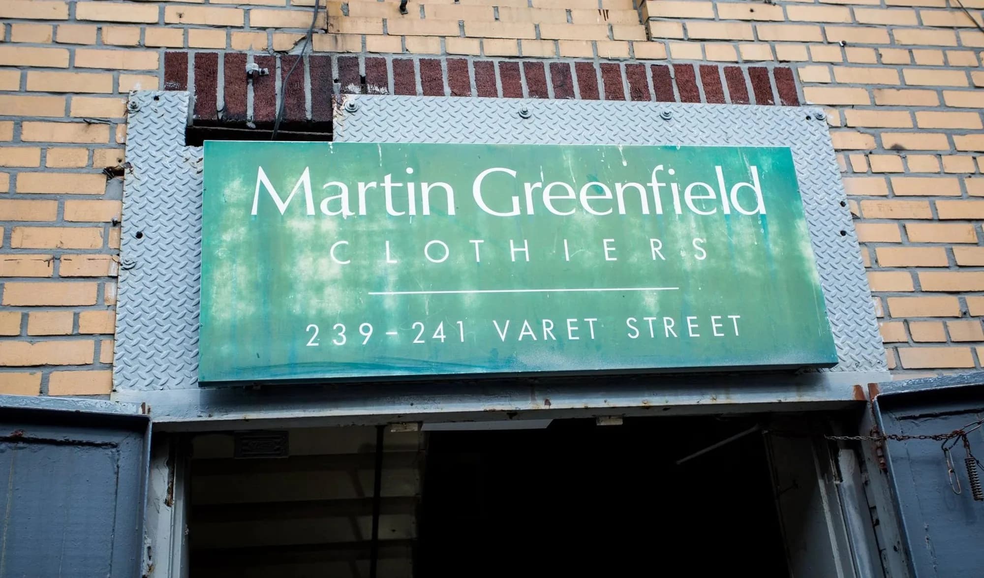 Martin Greenfield Clothiers sign outside of our Factory